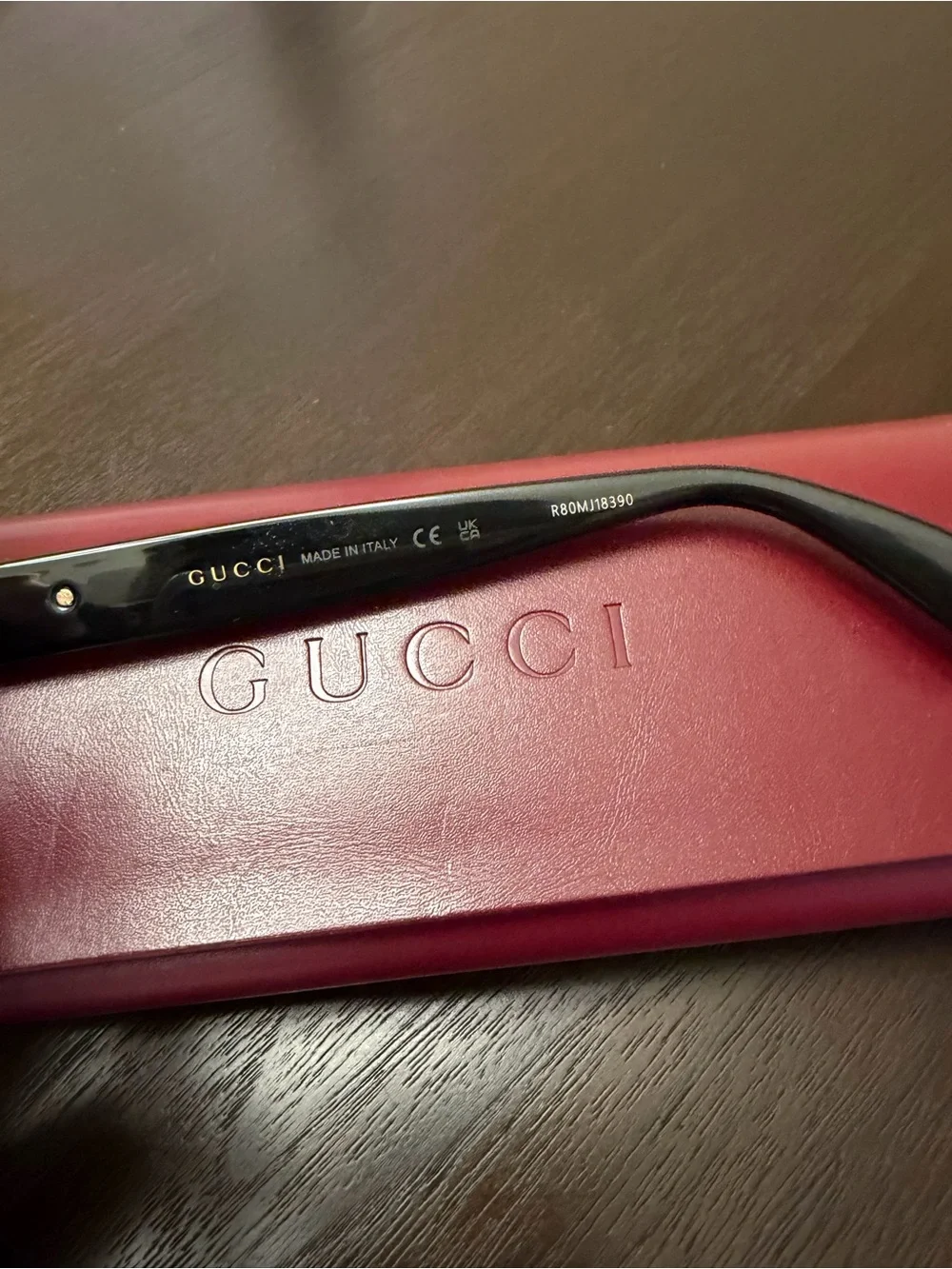 Gucci Black Cat-Eye Women's Sunglasses with Red Logo Case